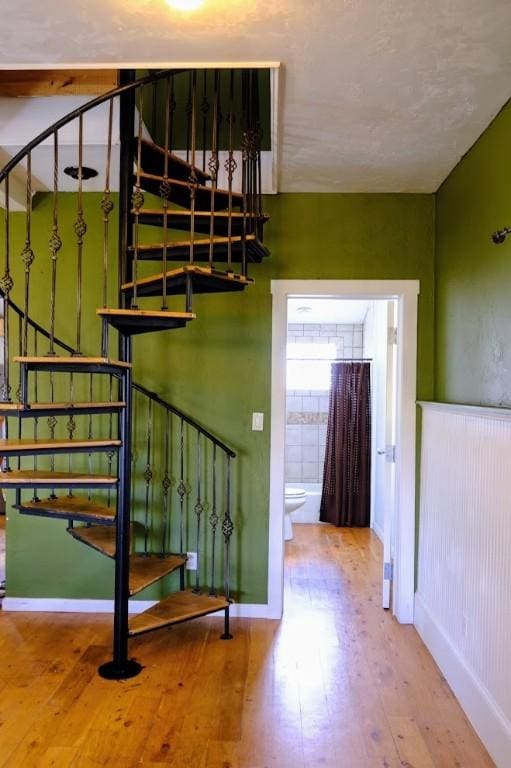 436 Clifton Ave, Yampa, CO 80483 - stairs featuring wood-type flooring and baseboards