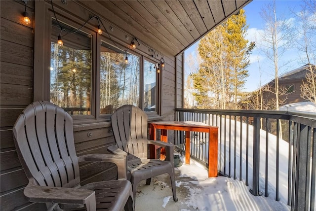 view of snow covered deck