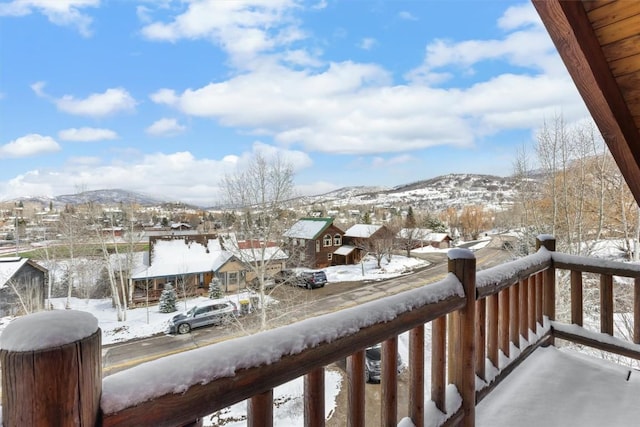 625 Amethyst Dr, Steamboat Springs, CO 80487 - snow covered back of property featuring a mountain view