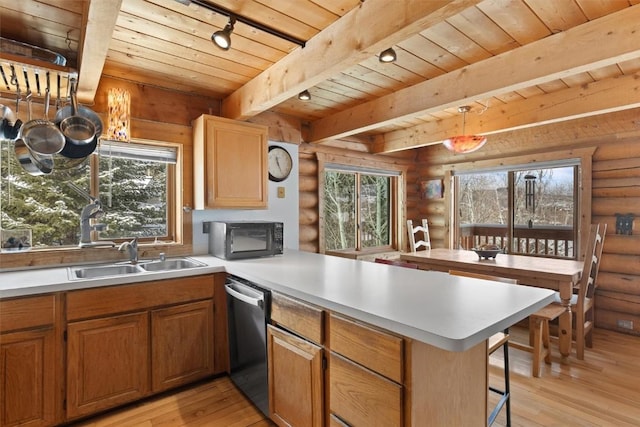 625 Amethyst Dr, Steamboat Springs, CO 80487 - kitchen featuring dishwasher, black microwave, rustic walls, a peninsula, and wooden ceiling with exposed beams