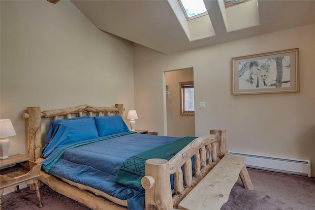 61 Pine Cir, Breckenridge, CO 80424 - bedroom featuring baseboard heating, carpet flooring, multiple windows, a skylight, and lofted ceiling
