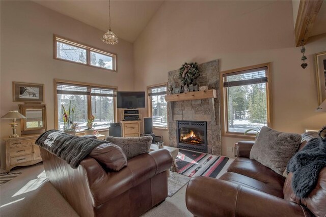 61 Pine Cir, Breckenridge, CO 80424 - living area with a wealth of natural light, high vaulted ceiling, and light colored carpet
