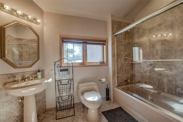 61 Pine Cir, Breckenridge, CO 80424 - bathroom with tile patterned flooring and shower / bath combination with glass door