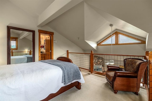 435 Ore House Plz Unit 301, Steamboat Springs, CO 80487 - bedroom featuring vaulted ceiling, carpet floors, and multiple windows
