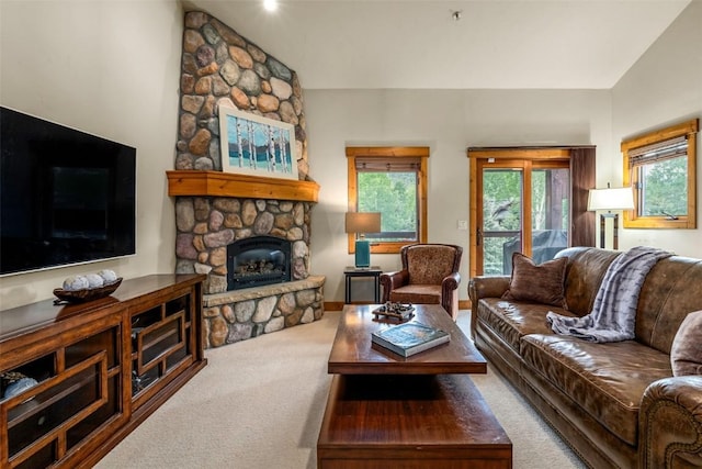 435 Ore House Plz Unit 301, Steamboat Springs, CO 80487 - carpeted living room with a fireplace
