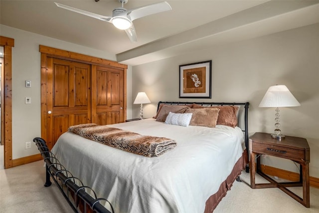 435 Ore House Plz Unit 301, Steamboat Springs, CO 80487 - bedroom featuring light carpet and a ceiling fan
