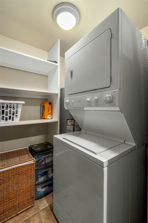 435 Ore House Plz Unit 301, Steamboat Springs, CO 80487 - laundry room featuring estacked washer and dryer
