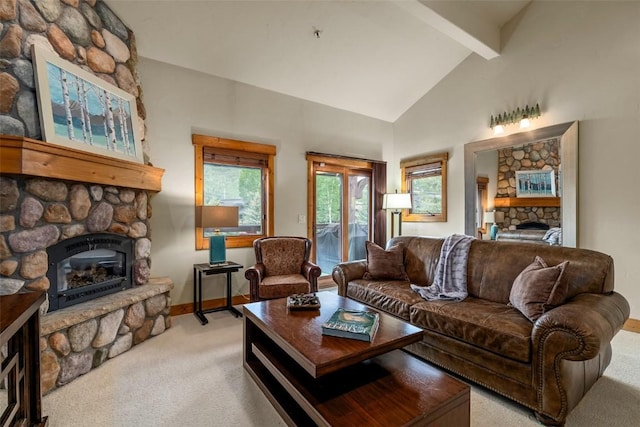 435 Ore House Plz Unit 301, Steamboat Springs, CO 80487 - living area with a fireplace, light carpet, beam ceiling, and high vaulted ceiling