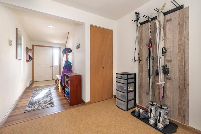 122 Gcr 442 Unit 2B, Grand Lake, CO 80447 - hall featuring a baseboard heating unit, baseboards, wood finished floors, and recessed lighting