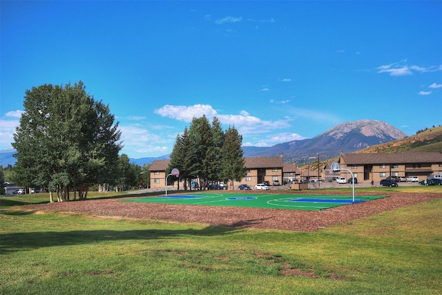 1153 Straight Creek Dr Unit 204, Dillon, CO 80435 - view of community featuring a yard, a mountain view, and community basketball court