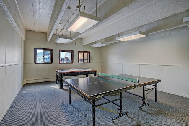 1153 Straight Creek Dr Unit 204, Dillon, CO 80435 - playroom featuring carpet floors, a baseboard radiator, and beamed ceiling