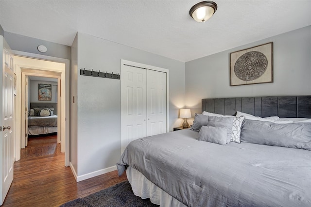 1153 Straight Creek Dr Unit 204, Dillon, CO 80435 - bedroom featuring wood finished floors, a closet, and baseboards