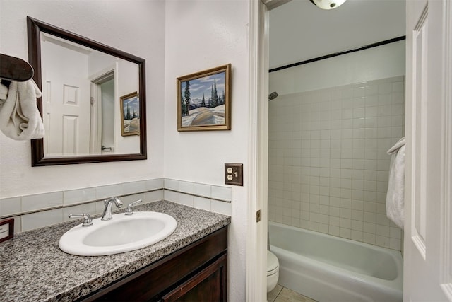1153 Straight Creek Dr Unit 204, Dillon, CO 80435 - bathroom with vanity, toilet, shower / washtub combination, and tasteful backsplash