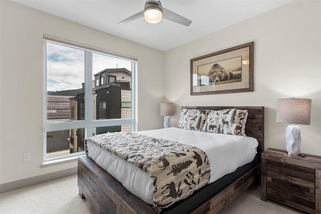 bedroom with carpet floors and a ceiling fan