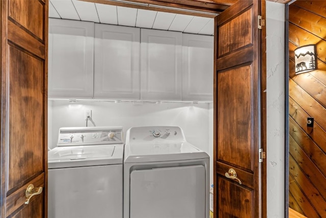 31650 Mt Werner Rd, Steamboat Springs, CO 80487 - laundry room with washing machine and clothes dryer and cabinet space