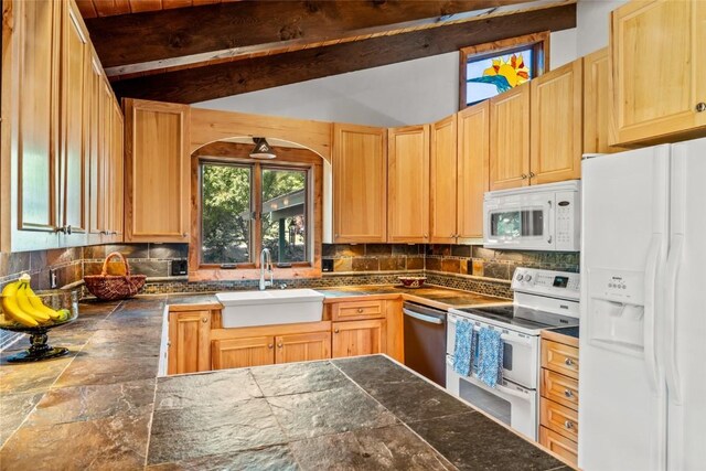 31650 Mt Werner Rd, Steamboat Springs, CO 80487 - kitchen featuring white appliances, decorative backsplash, light brown cabinets, and arched walkways