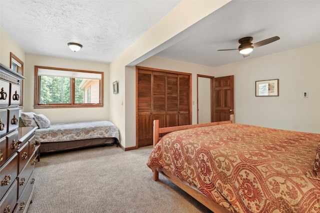112 N Pine St, Breckenridge, CO 80424 - carpeted bedroom with a closet, ceiling fan, a textured ceiling, and baseboards