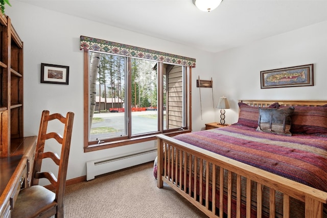 112 N Pine St, Breckenridge, CO 80424 - carpeted bedroom featuring a baseboard radiator and baseboards