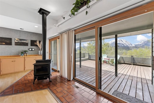 71 Barking Dog Rd, Silverthorne, CO 80498 - entryway with a wood stove and a mountain view