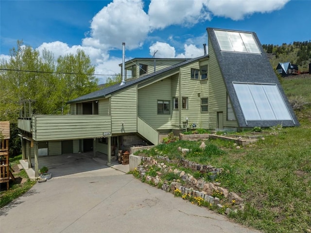 71 Barking Dog Rd, Silverthorne, CO 80498 - view of home's exterior featuring a wooden deck and roof with shingles