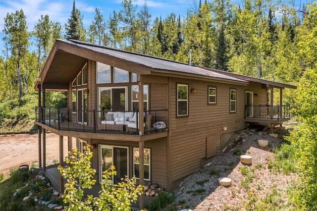 58195 Jupiter Pl, Clark, CO 80428 - rear view of house featuring a metal roof