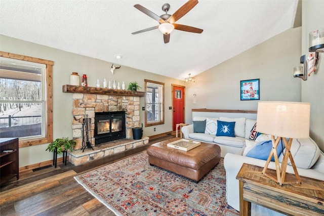 58195 Jupiter Pl, Clark, CO 80428 - living room featuring vaulted ceiling, ceiling fan, wood finished floors, and a fireplace
