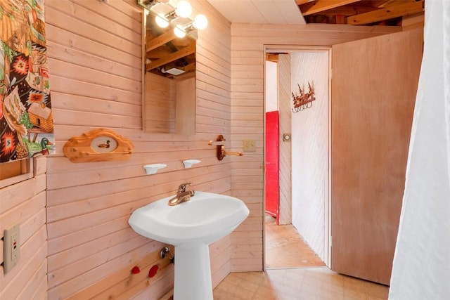 902 Hawk Way, Como, CO 80456 - bathroom featuring wooden walls and tile patterned floors