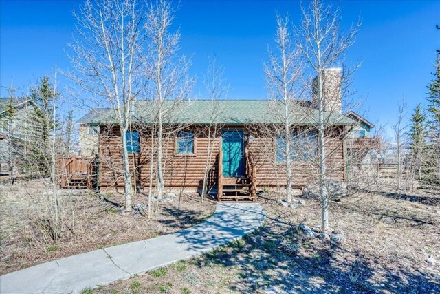 23 Fuller Dr Unit B, Fairplay, CO 80440 - ranch-style house featuring a chimney and entry steps