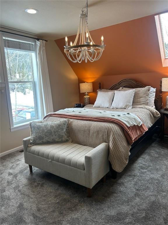 38 Huckleberry Grn, Breckenridge, CO 80424 - carpeted bedroom featuring a chandelier and recessed lighting