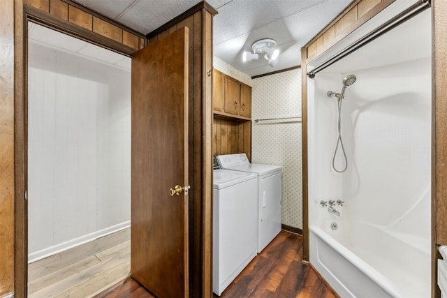 361 Lagoon Ln, Silverthorne, CO 80498 - laundry room featuring wood finished floors, independent washer and dryer, wallpapered walls, and baseboards