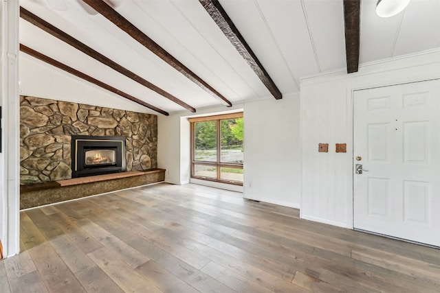 361 Lagoon Ln, Silverthorne, CO 80498 - unfurnished living room featuring baseboards, wood finished floors, and a fireplace