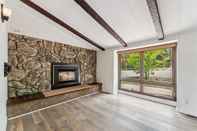 361 Lagoon Ln, Silverthorne, CO 80498 - unfurnished living room featuring wood-type flooring, baseboards, and a fireplace