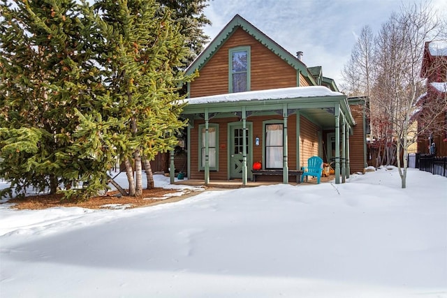 110 S Harris St, Breckenridge, CO 80424 - view of front of house with fence and covered porch