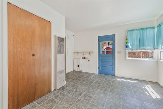 190 N Walnut St, Hayden, CO 81639 - foyer featuring a heating unit and tile patterned flooring