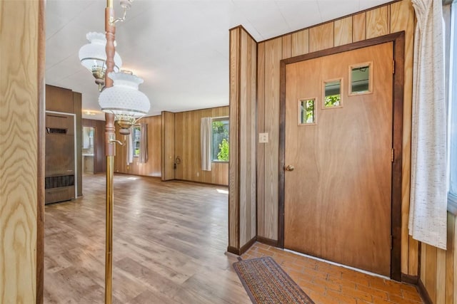 190 N Walnut St, Hayden, CO 81639 - foyer entrance with a chandelier and wood walls