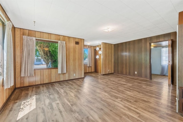 190 N Walnut St, Hayden, CO 81639 - spare room with wood finished floors and wooden walls