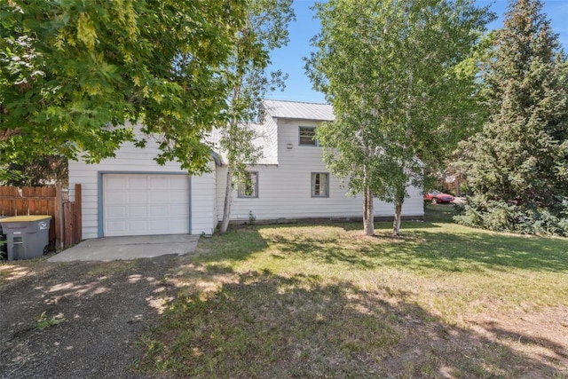 190 N Walnut St, Hayden, CO 81639 - view of front of home featuring a garage and dirt driveway