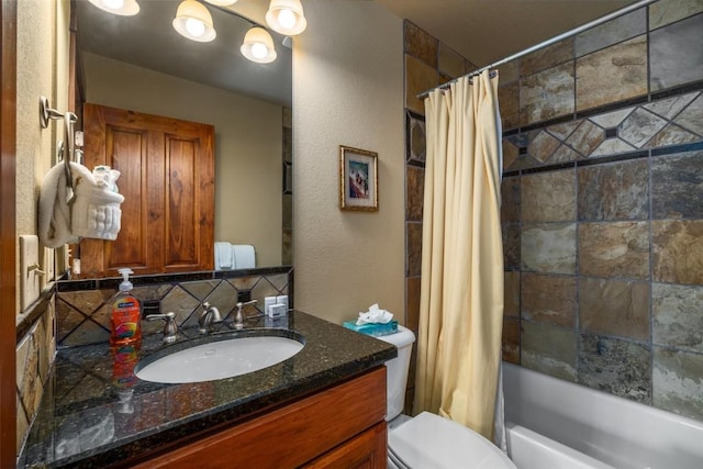 1532 Moraine Cir Unit 40, Steamboat Springs, CO 80487 - full bath featuring toilet, tasteful backsplash, vanity, and shower / tub combo with curtain