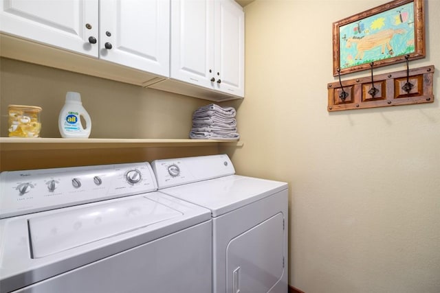1532 Moraine Cir Unit 40, Steamboat Springs, CO 80487 - clothes washing area featuring cabinet space and washer and dryer