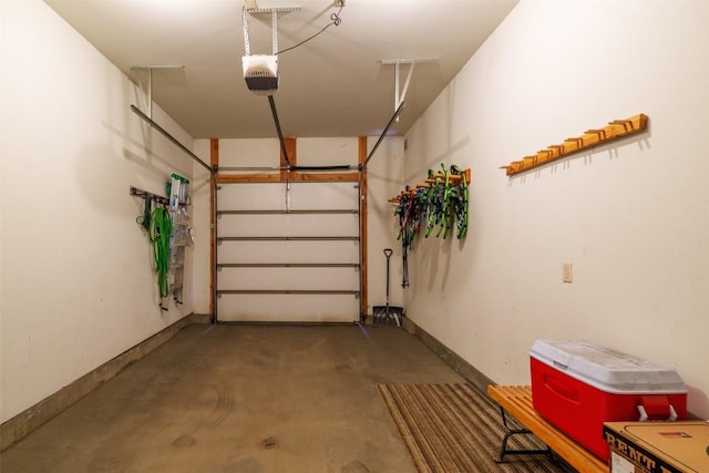 1532 Moraine Cir Unit 40, Steamboat Springs, CO 80487 - garage with baseboards and a garage door opener