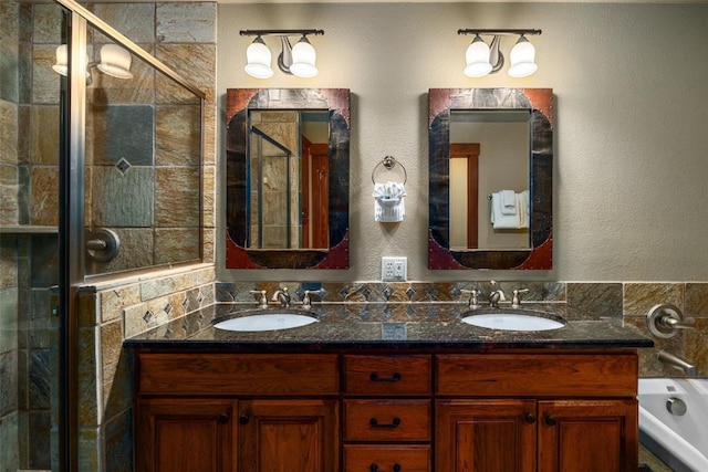 1532 Moraine Cir Unit 40, Steamboat Springs, CO 80487 - full bathroom with double vanity, a stall shower, and a sink