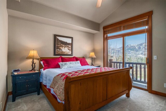 1532 Moraine Cir Unit 40, Steamboat Springs, CO 80487 - bedroom with carpet floors, access to outside, vaulted ceiling, and multiple windows