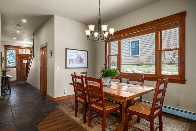 1532 Moraine Cir Unit 40, Steamboat Springs, CO 80487 - dining area with recessed lighting, a baseboard radiator, baseboards, and an inviting chandelier