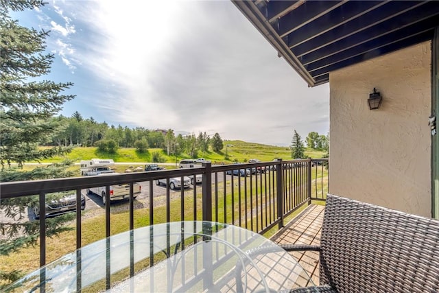 balcony featuring outdoor dining space