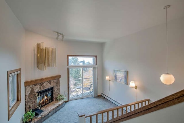 carpeted living room with a fireplace