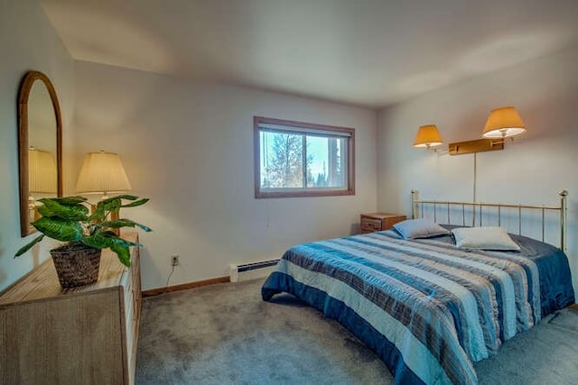 bedroom with a baseboard radiator, carpet, and baseboards