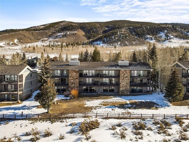 72 Corinthian Cir Unit 303, Dillon, CO 80435 - snowy aerial view featuring a mountain view