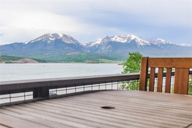 72 Corinthian Cir Unit 303, Dillon, CO 80435 - wooden terrace featuring a water and mountain view