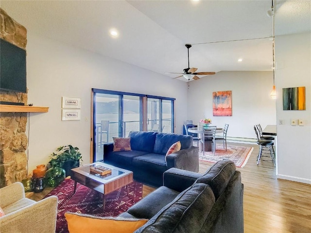 72 Corinthian Cir Unit 303, Dillon, CO 80435 - living room with vaulted ceiling, ceiling fan, wood finished floors, and recessed lighting