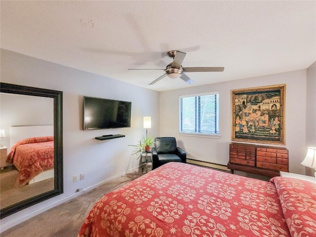 72 Corinthian Cir Unit 303, Dillon, CO 80435 - carpeted bedroom with baseboard heating and ceiling fan